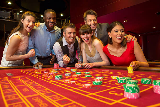 66d live roulette table with croupier and spinning wheel